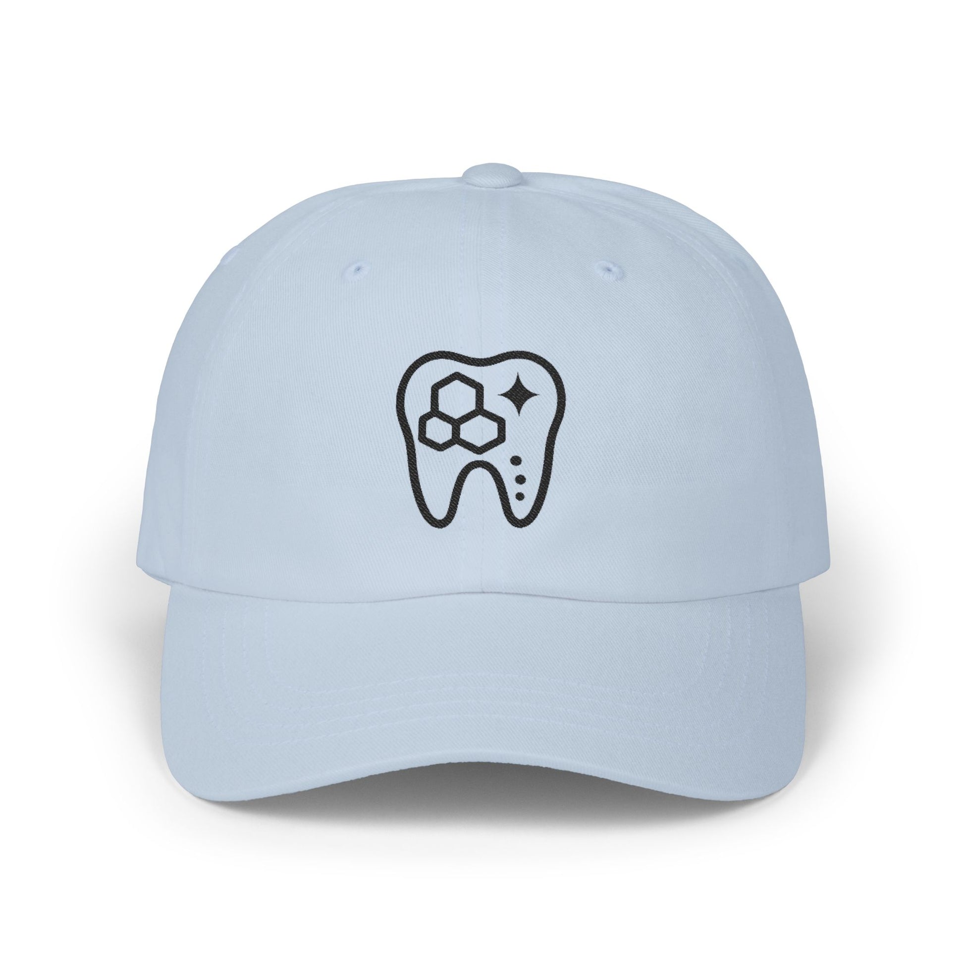 Light blue cap with a black tooth design on a white background